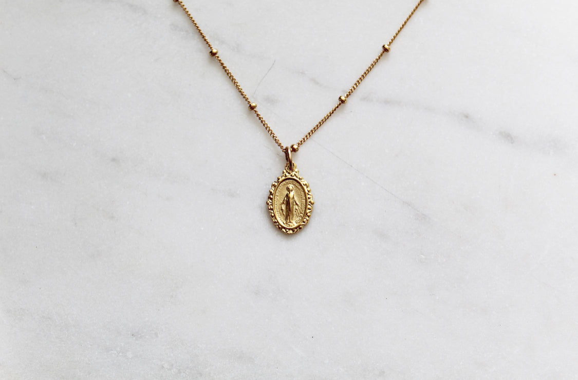 Intricate Miraculous medal necklace